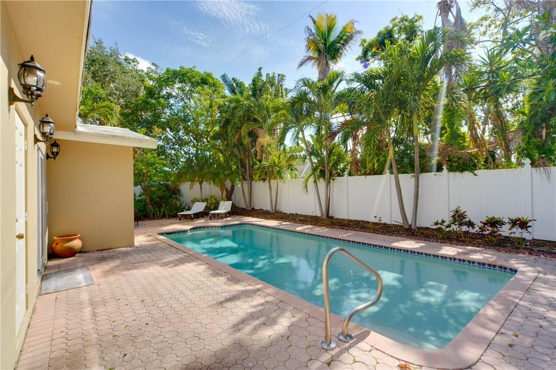 2660 Northeast 2nd Avenue Boca Raton, FL 33431 - Photo 20 of 29 view of a house with swimming pool and sitting area