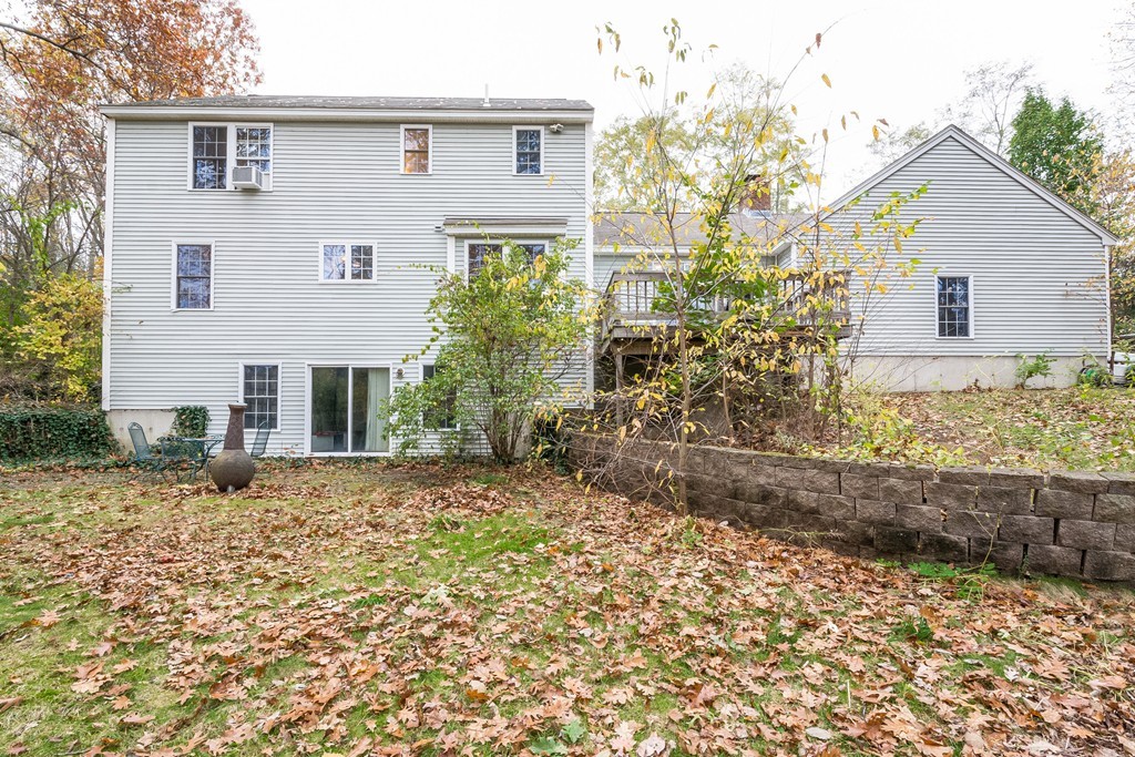 215 Bolton Road Lancaster, MA 01523 - Photo 2 of 14 a front view of a house with garden