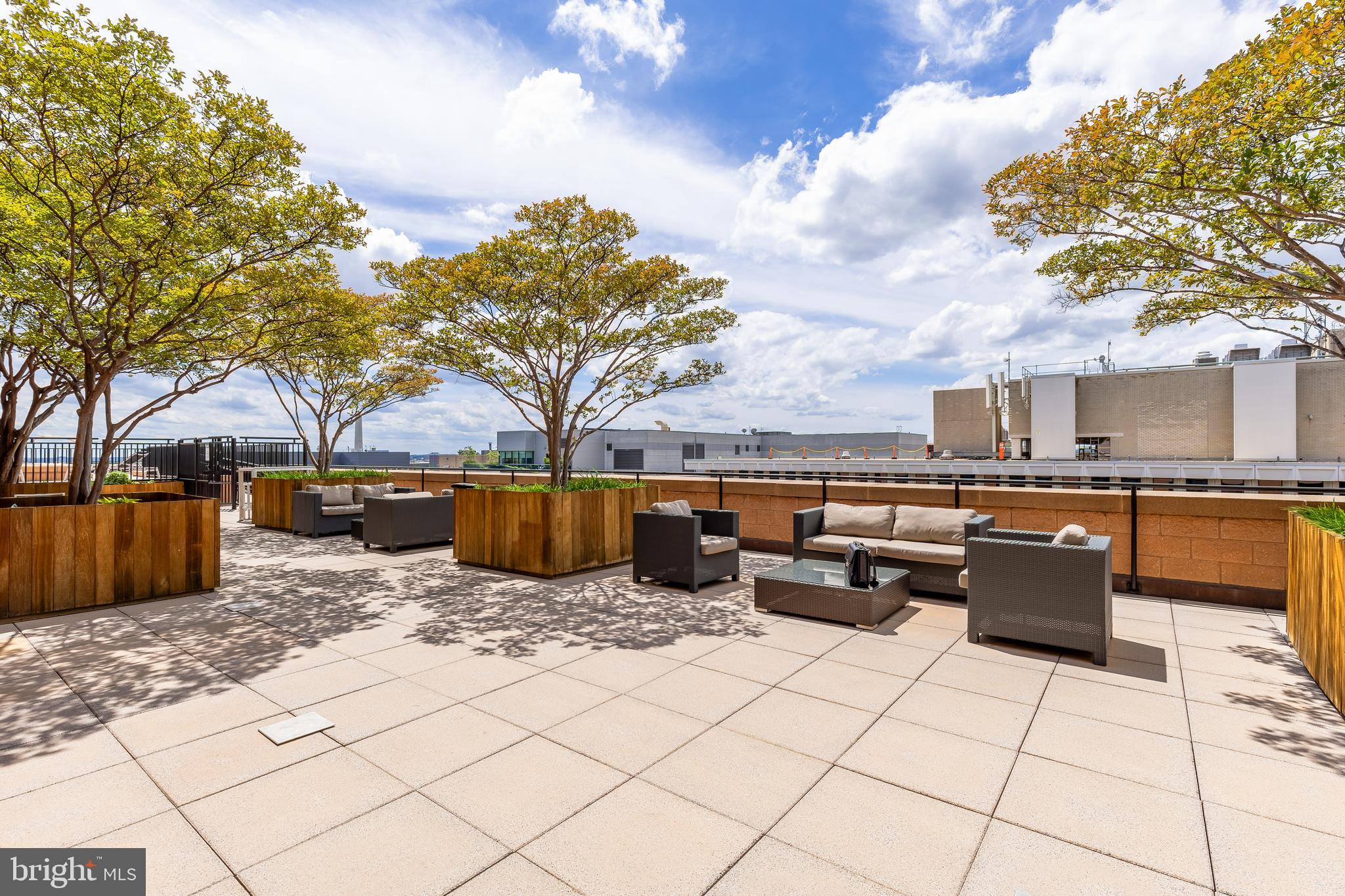 1010 Massachusetts Avenue Northwest, Unit 211 Washington, DC 20001 - Photo 20 of 27 a view of a terrace with chairs