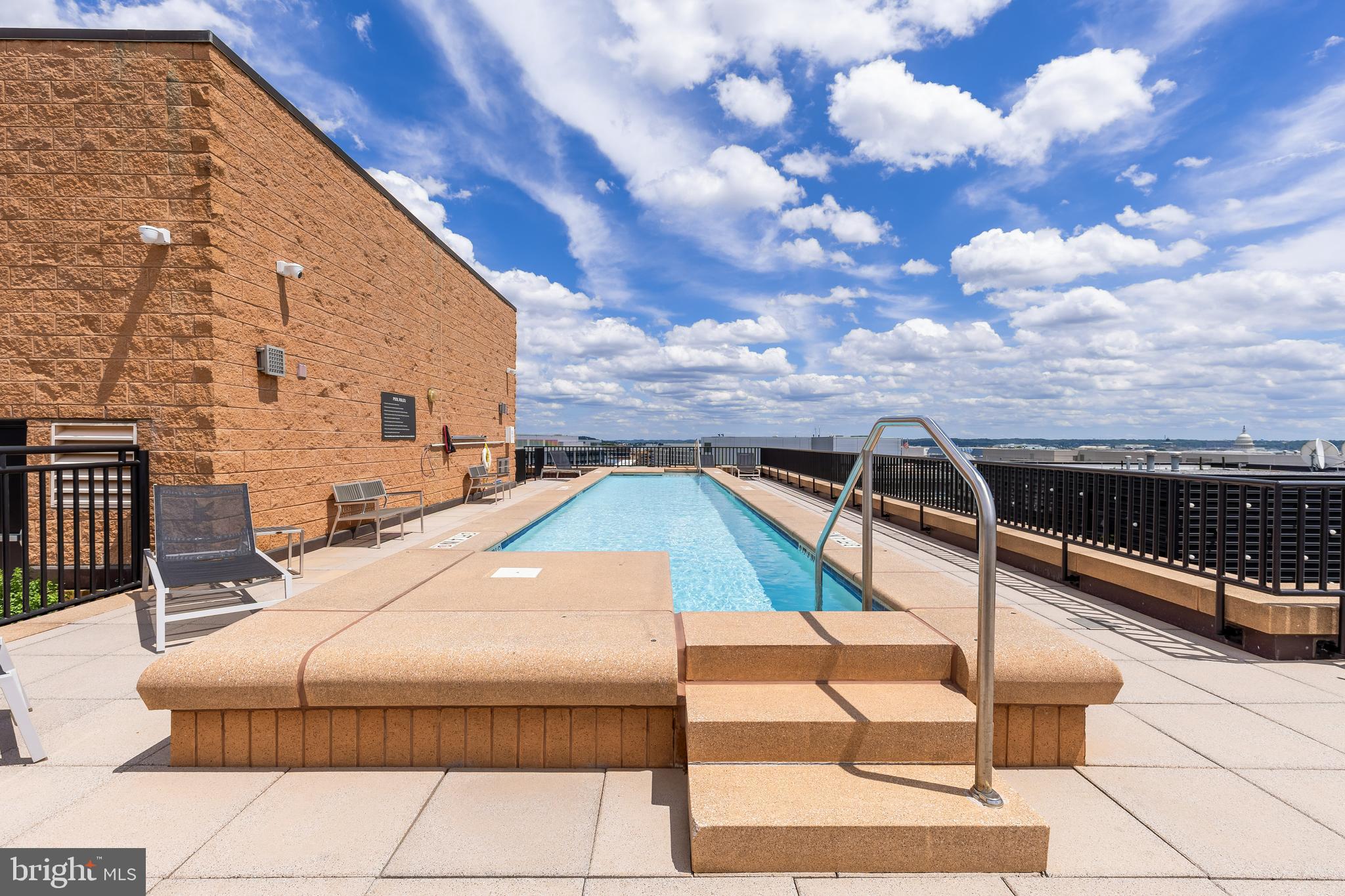 1010 Massachusetts Avenue Northwest, Unit 211 Washington, DC 20001 - Photo 21 of 27 a aerial view of a house with swimming pool