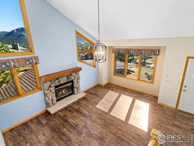 a bedroom with a bed and glass window