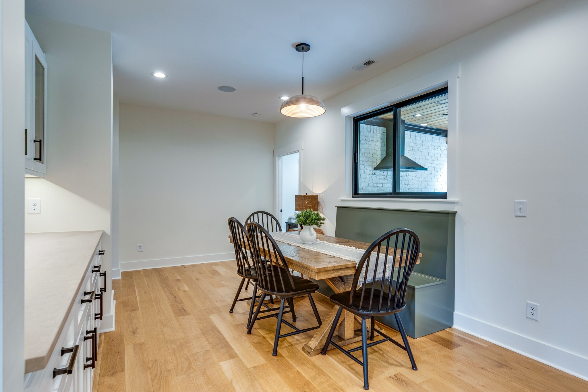 564 Mt Olive Cemetery Road Lynnville, TN 38472 - Photo 17 of 96 a view of a dining room with furniture and wooden floor