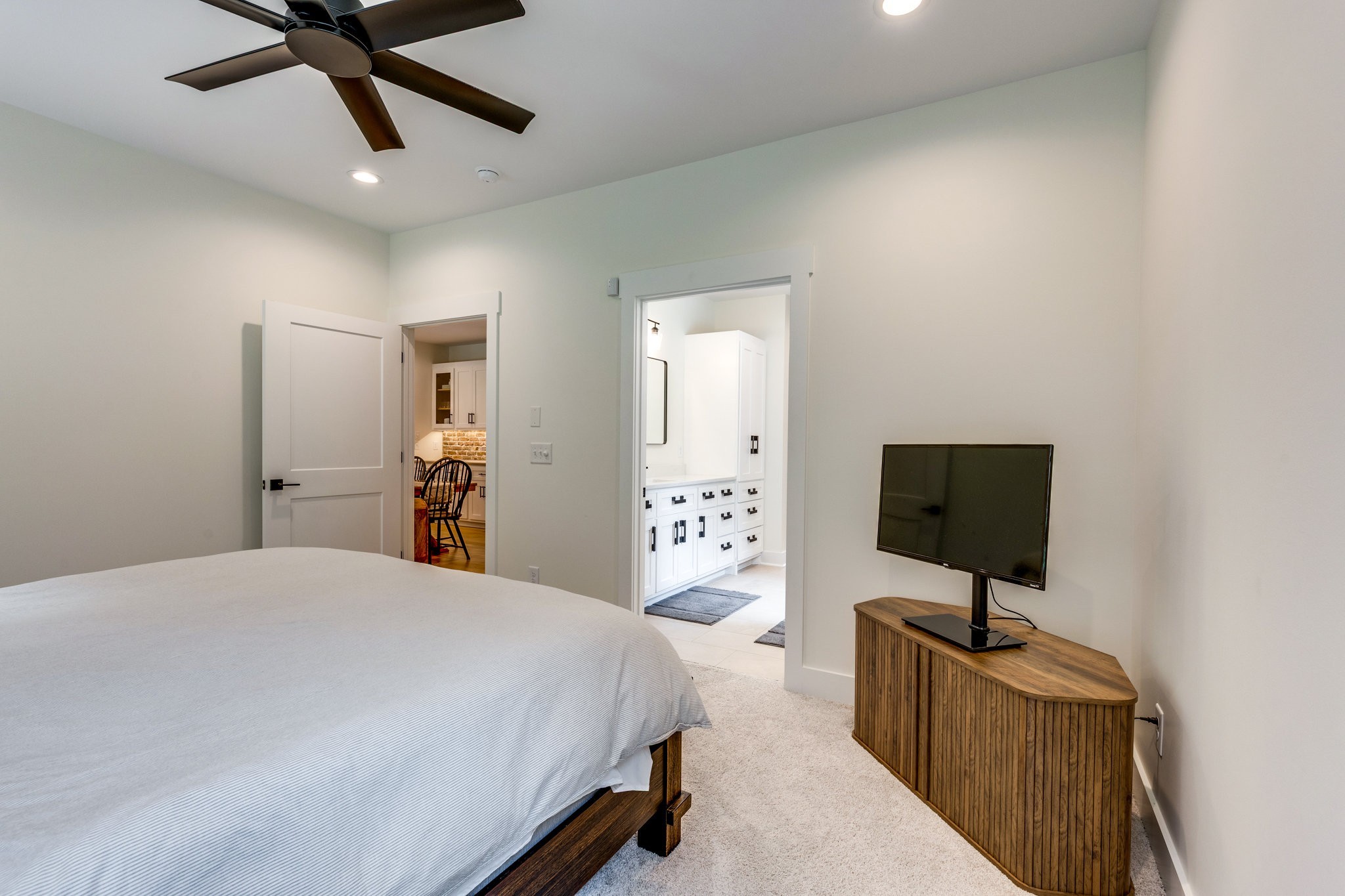 564 Mt Olive Cemetery Road Lynnville, TN 38472 - Photo 24 of 96 a bedroom with a bed and a flat screen tv