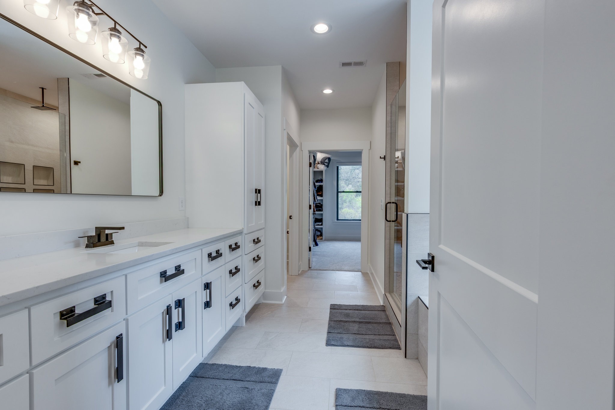 564 Mt Olive Cemetery Road Lynnville, TN 38472 - Photo 25 of 96 a bathroom with double vanity and a shower