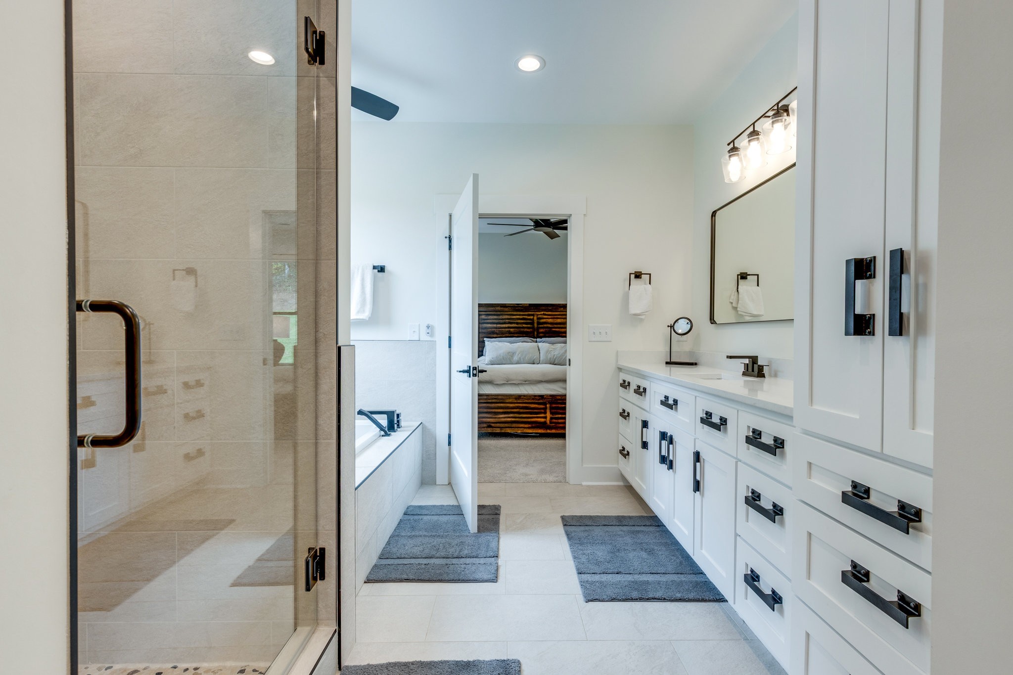 564 Mt Olive Cemetery Road Lynnville, TN 38472 - Photo 26 of 96 a bathroom with a double vanity sink and a mirror