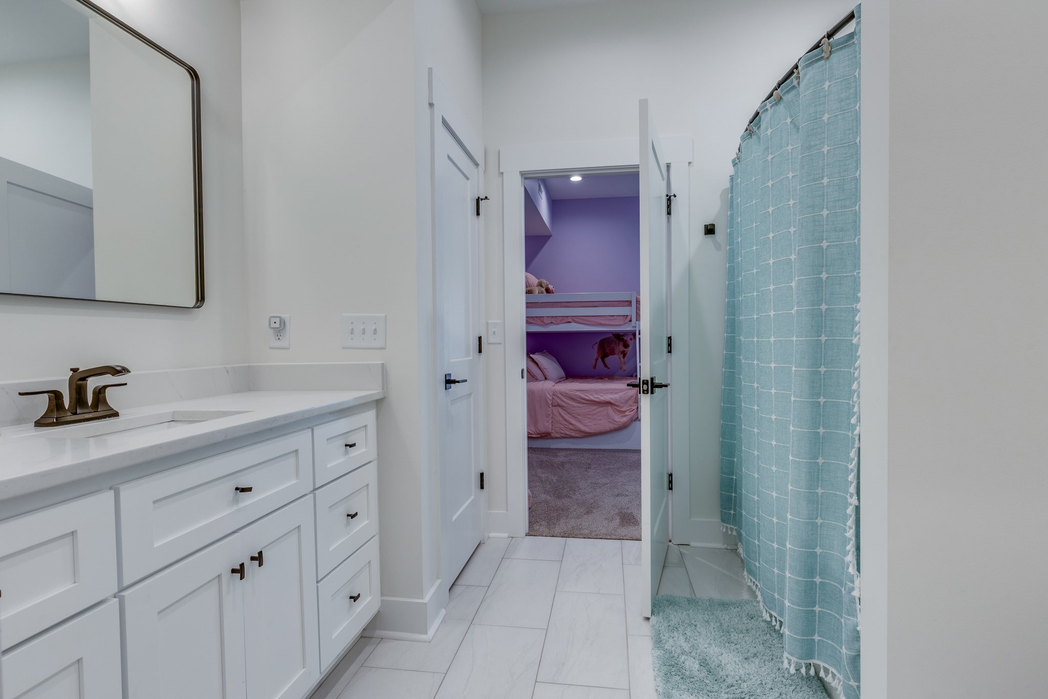 564 Mt Olive Cemetery Road Lynnville, TN 38472 - Photo 35 of 96 a en suite bathroom with a sink a mirror and a shower