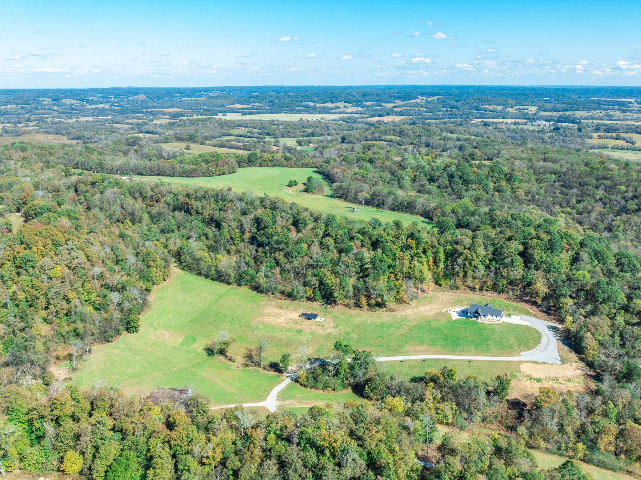 564 Mt Olive Cemetery Road Lynnville, TN 38472 - Photo 77 of 96 a view of a lake with a mountain
