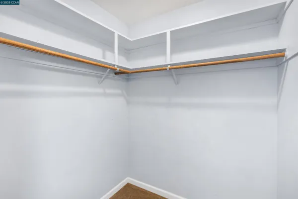 a kitchen with a cabinets and a stove