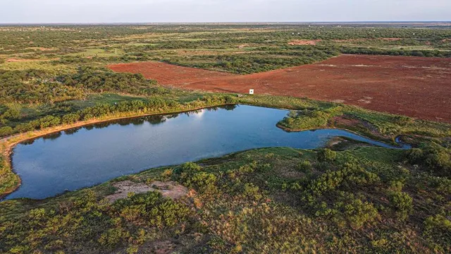 a view of an ocean and a city