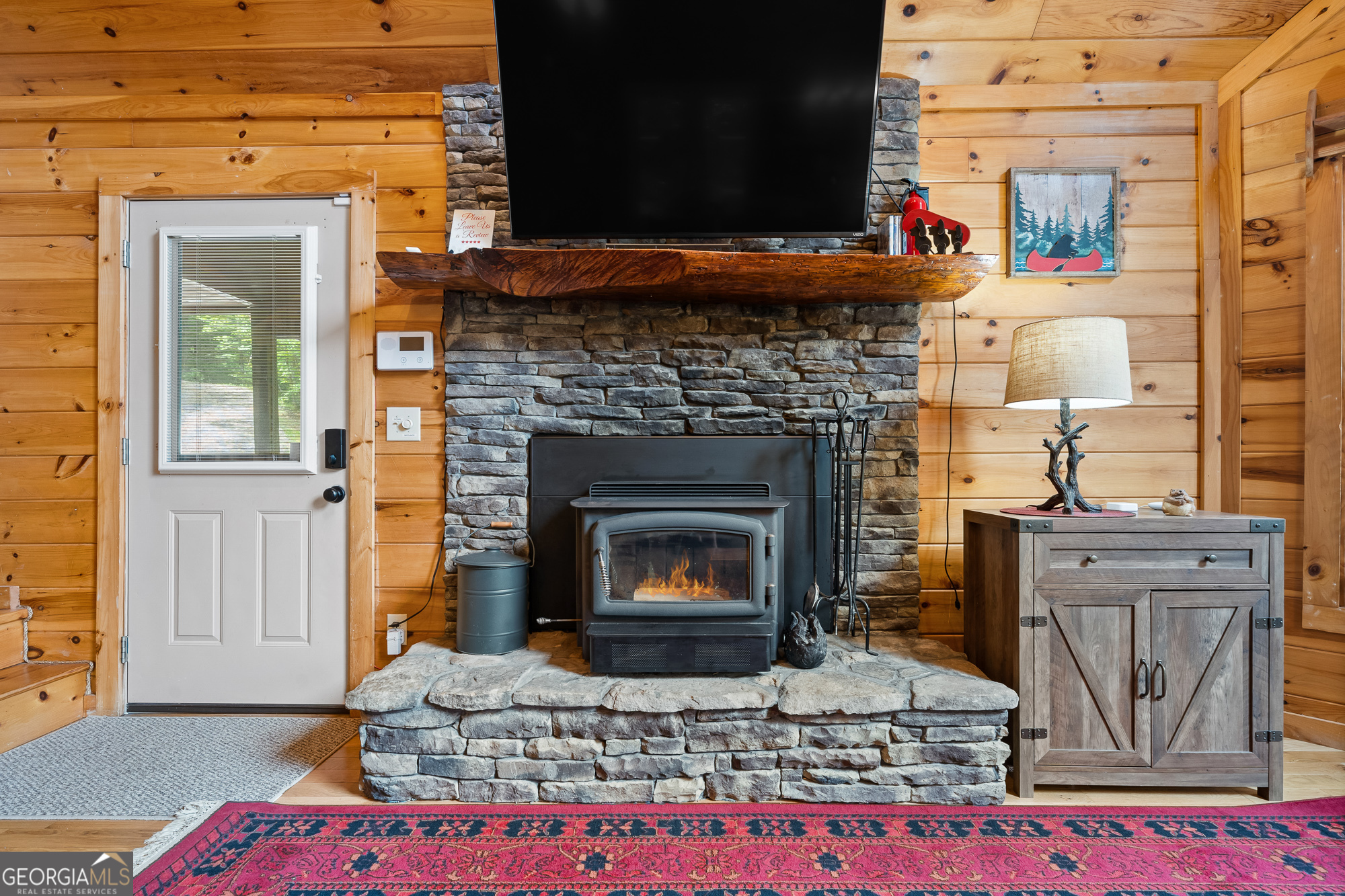 476 Prince Mountain Road Cherry Log, GA 30522 - Photo 13 of 80 a living room with furniture and a fireplace