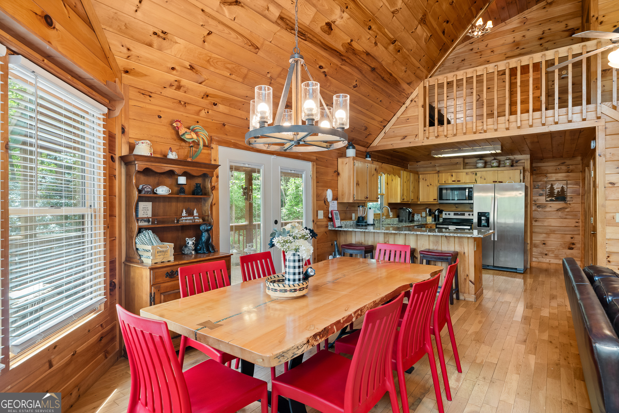 476 Prince Mountain Road Cherry Log, GA 30522 - Photo 16 of 80 a view of a dining table and chairs in the patio