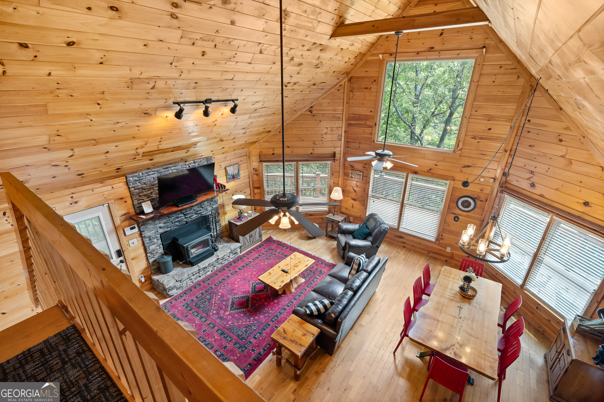 476 Prince Mountain Road Cherry Log, GA 30522 - Photo 30 of 80 a view of a balcony with chairs
