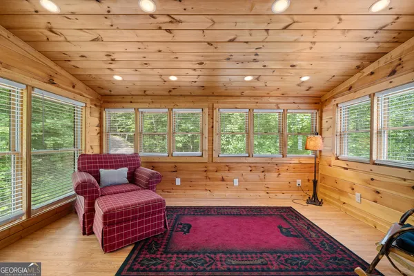 a kitchen with cabinets and a refrigerator