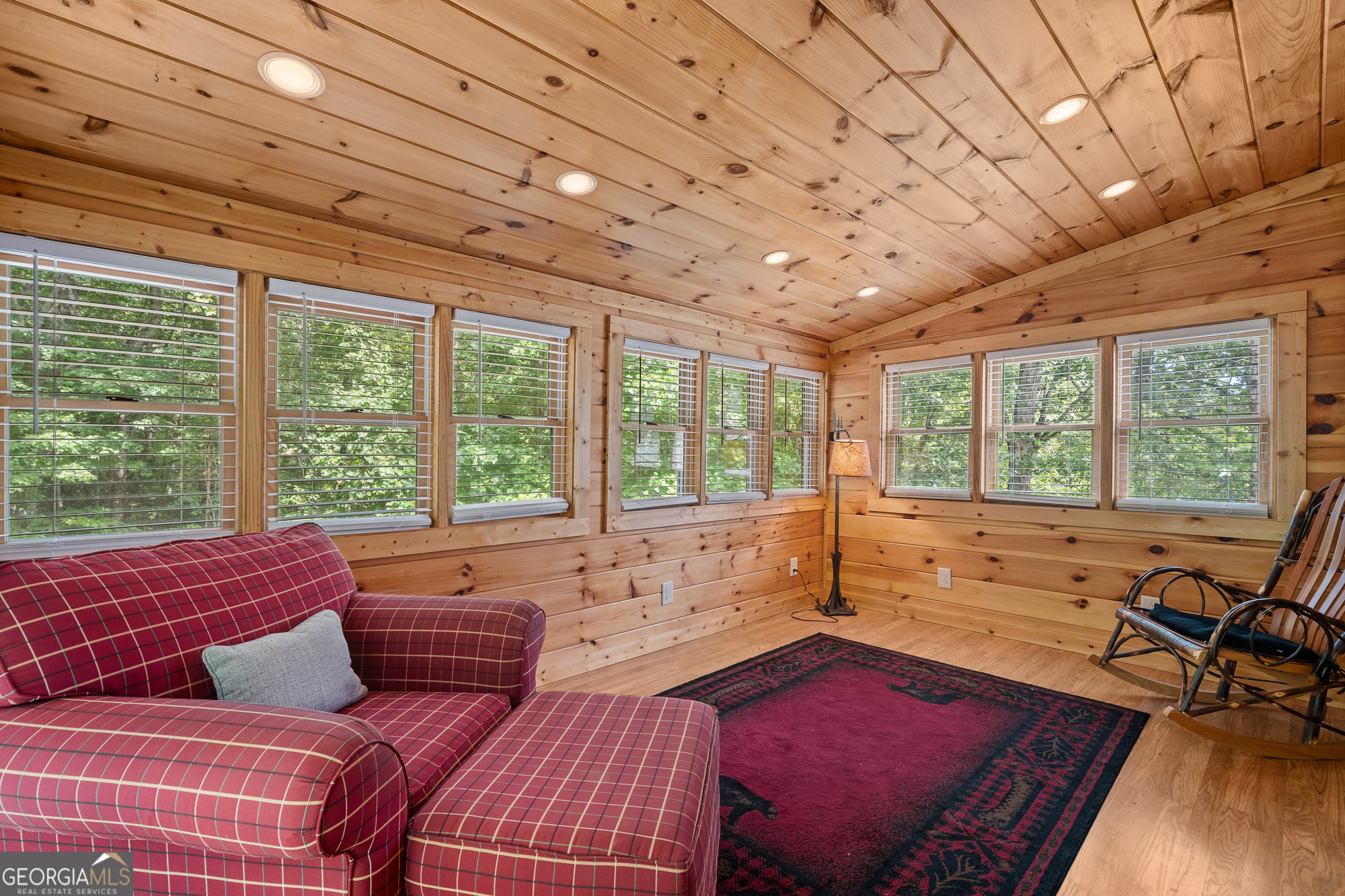 476 Prince Mountain Road Cherry Log, GA 30522 - Photo 36 of 80 a living room with furniture and a large window