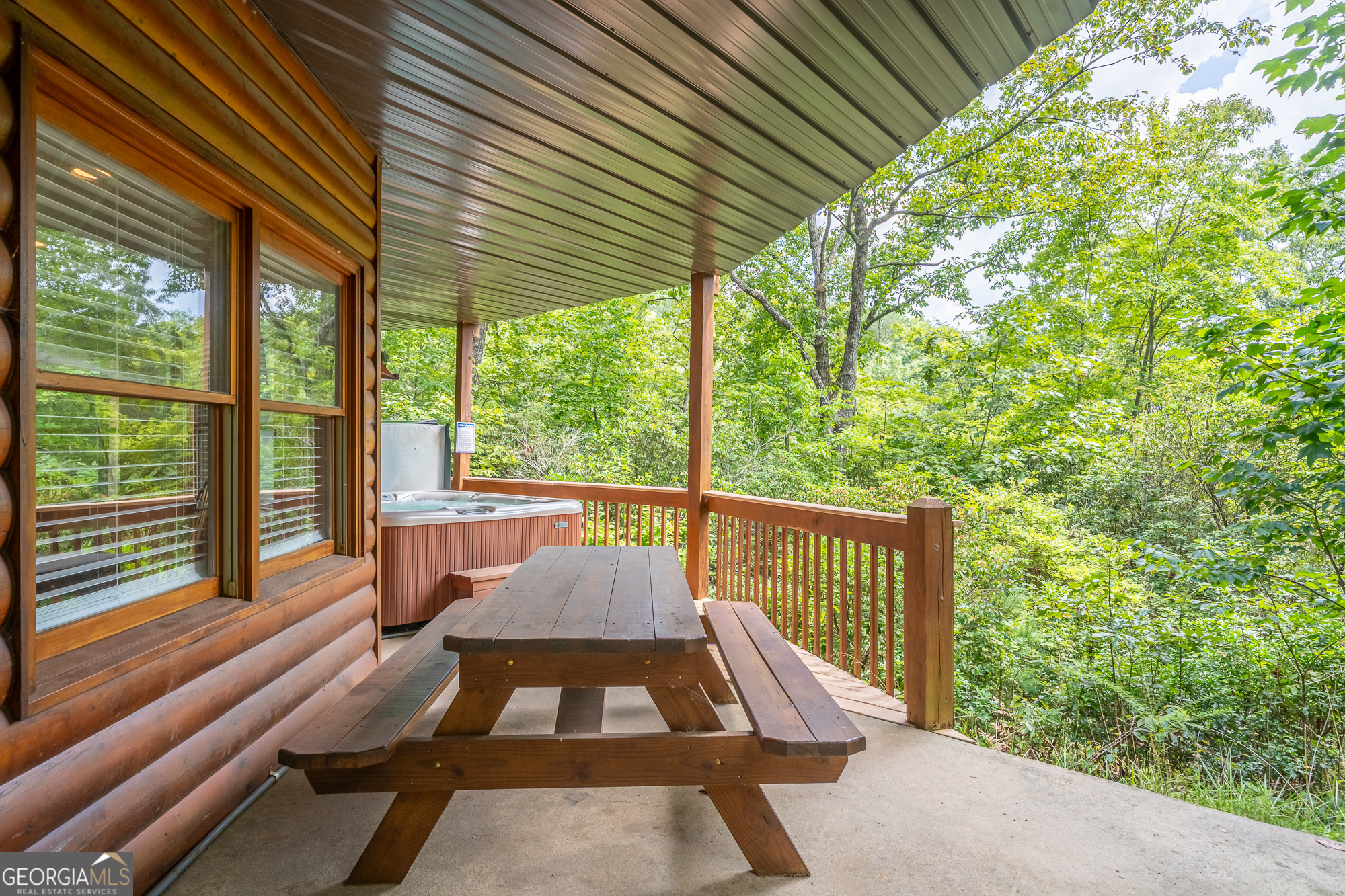 476 Prince Mountain Road Cherry Log, GA 30522 - Photo 58 of 80 a view of balcony with wooden floor and outdoor seating