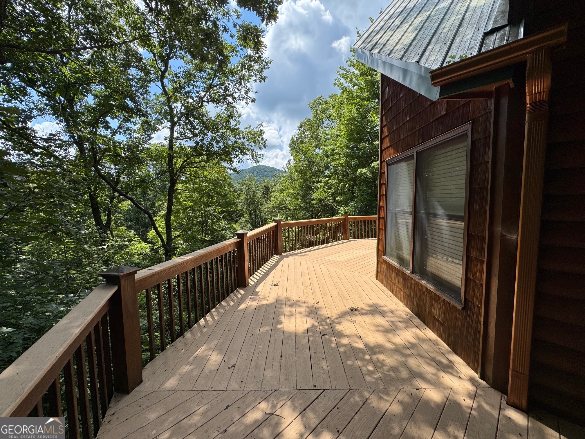 476 Prince Mountain Road Cherry Log, GA 30522 - Photo 6 of 80 a view of balcony and yard