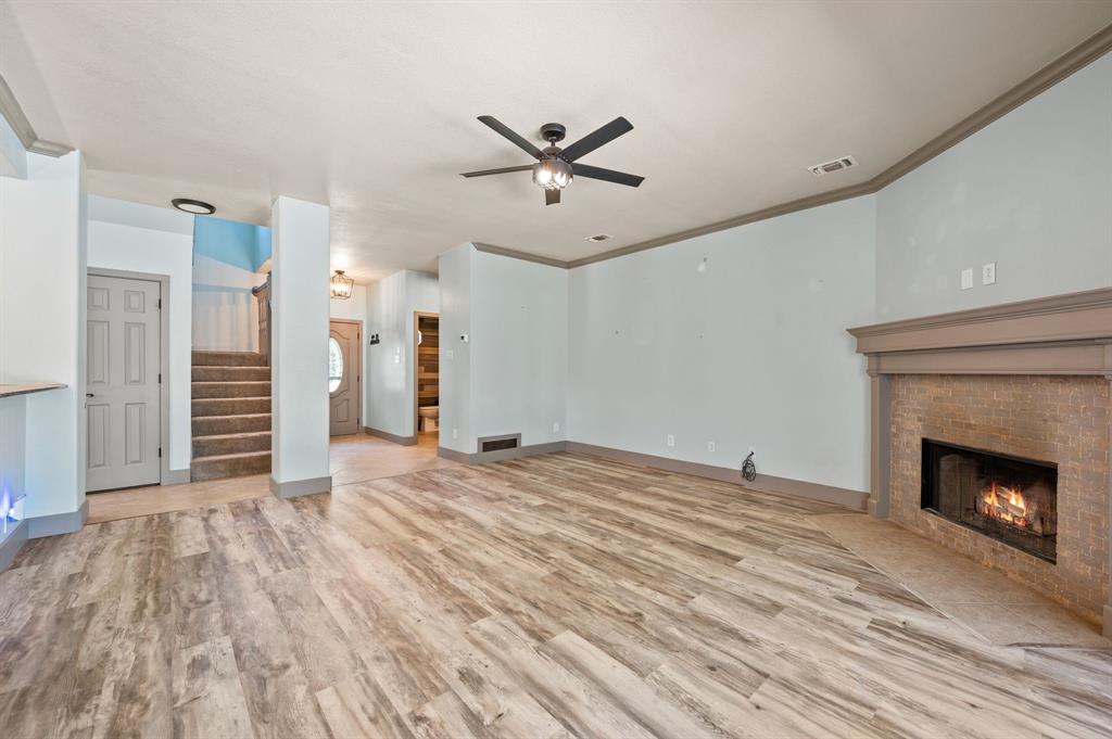 508 Chandler Road Keller, TX 76248 - Photo 37 of 39 View from the living room looking toward the foyer. This open floorplan is spacious and in move in ready condition with multiple updates! Both the above fireplace outlet ad the adjacent wall outlets are HDMI ready.