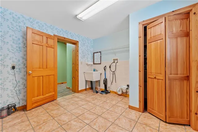 a room that has a bed and a window