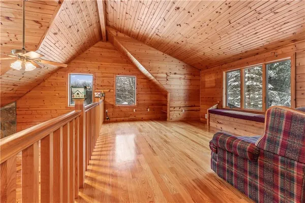 a balcony with wooden floor