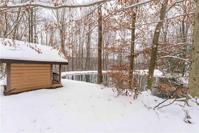 a view of mountain view with lot of trees