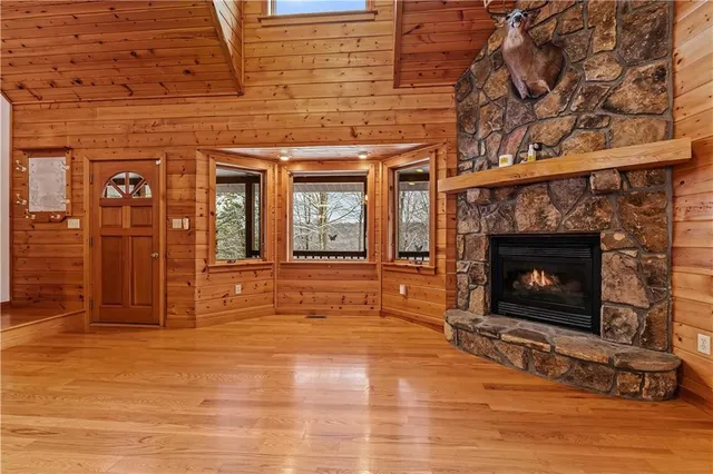a view of a fireplace with wooden floor