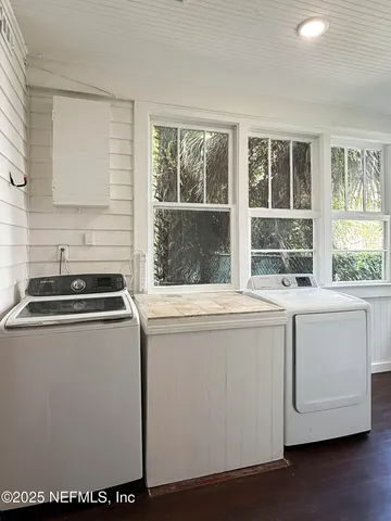a utility room with dryer and washer