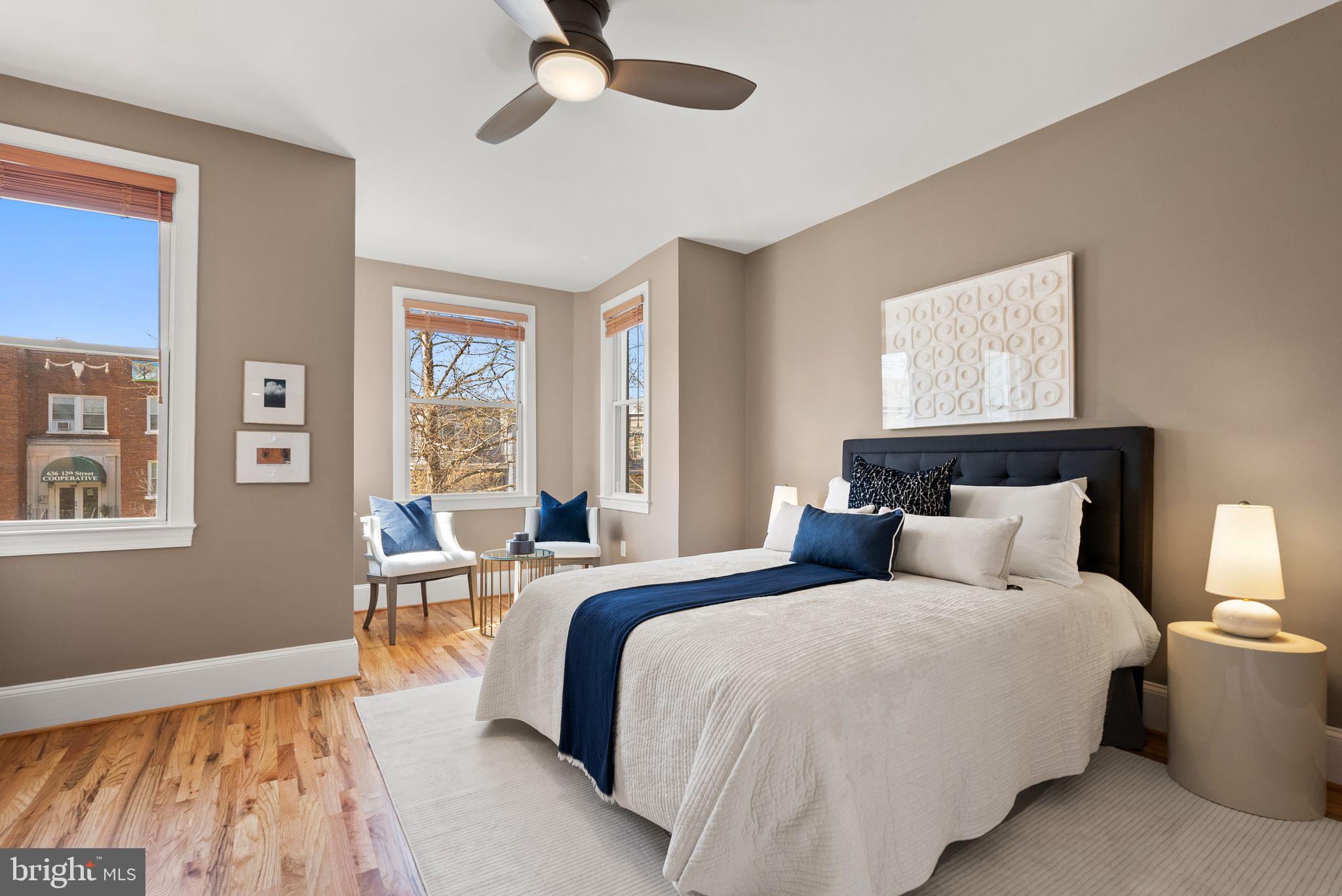 633 12th Street Northeast Washington, DC 20002 - Photo 20 of 44 a bedroom with double bed and a window