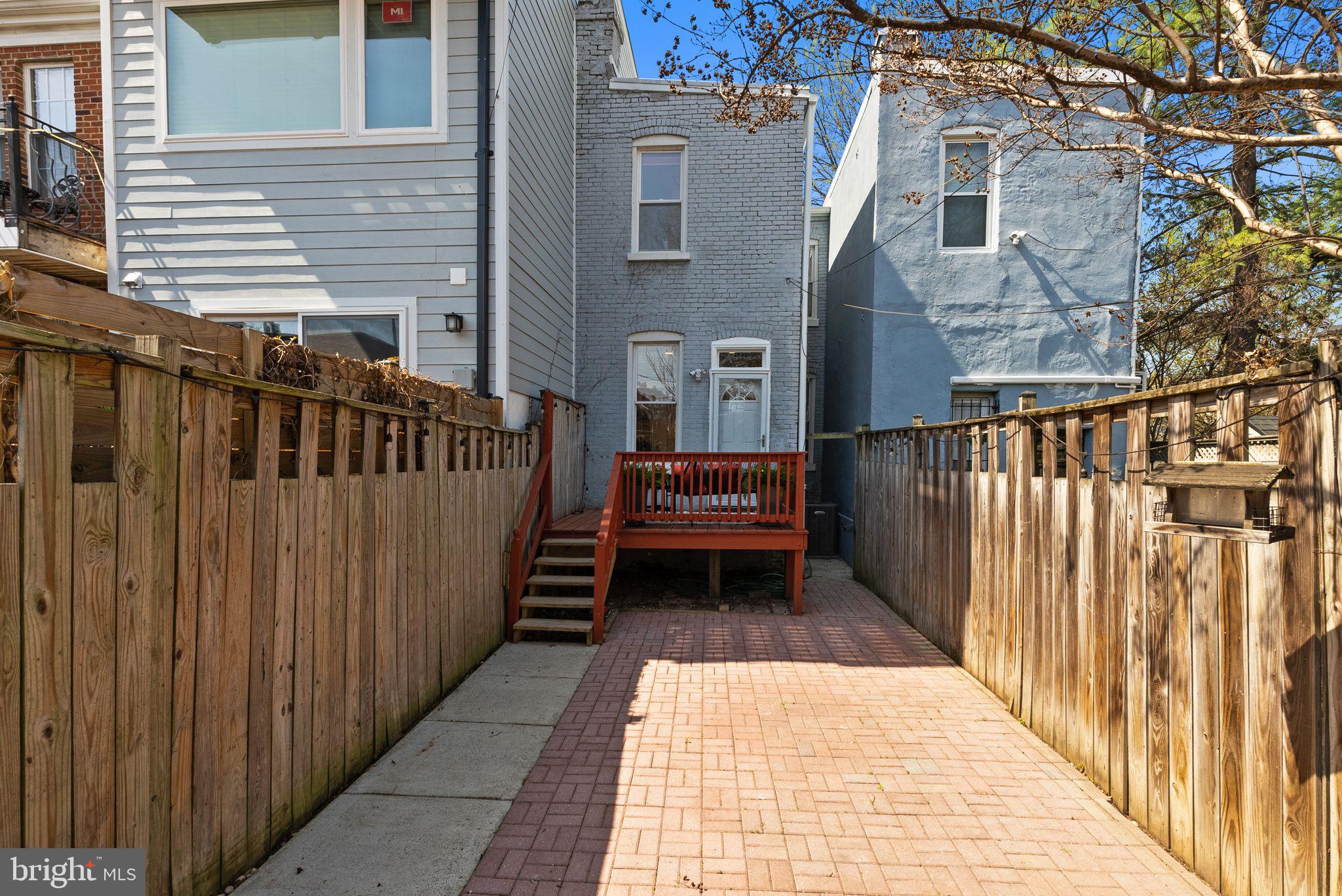 633 12th Street Northeast Washington, DC 20002 - Photo 33 of 44 a view of a pathway of a house with wooden fence