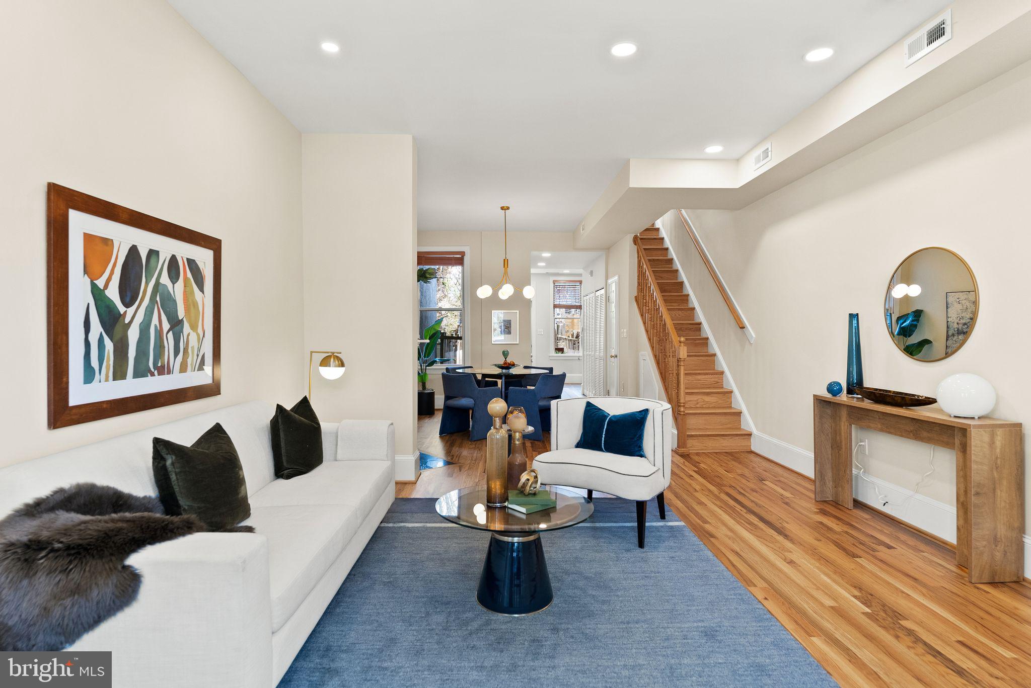 633 12th Street Northeast Washington, DC 20002 - Photo 5 of 44 a living room with furniture and wooden floor