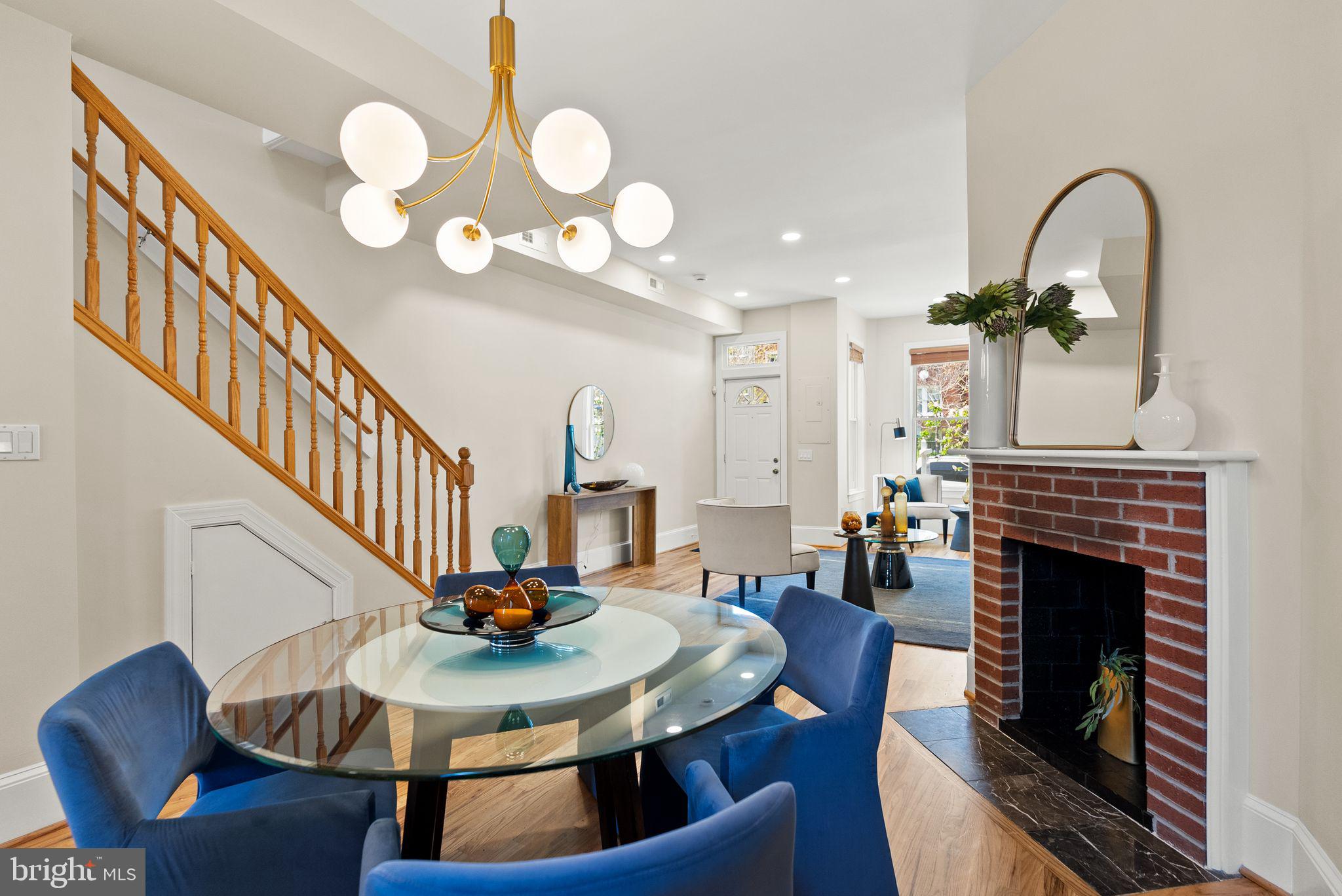 633 12th Street Northeast Washington, DC 20002 - Photo 10 of 44 a dining room with furniture and wooden floor