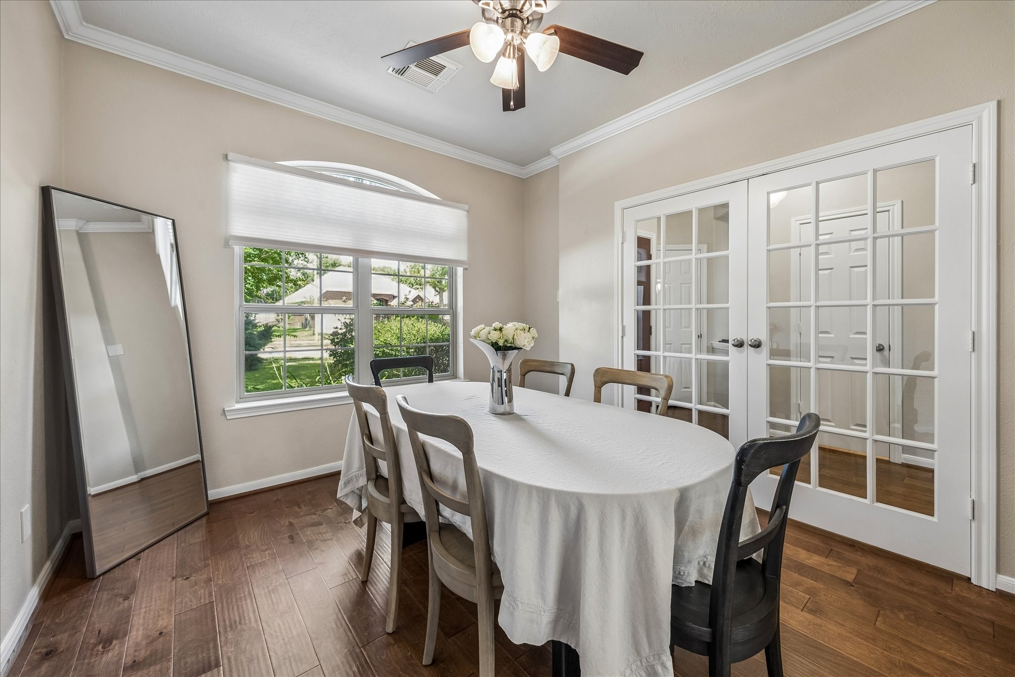 5811 Walkabout Way Katy, TX 77450 - Photo 14 of 33 Alternate view of the dining room showing double doors leading to the front foyer.