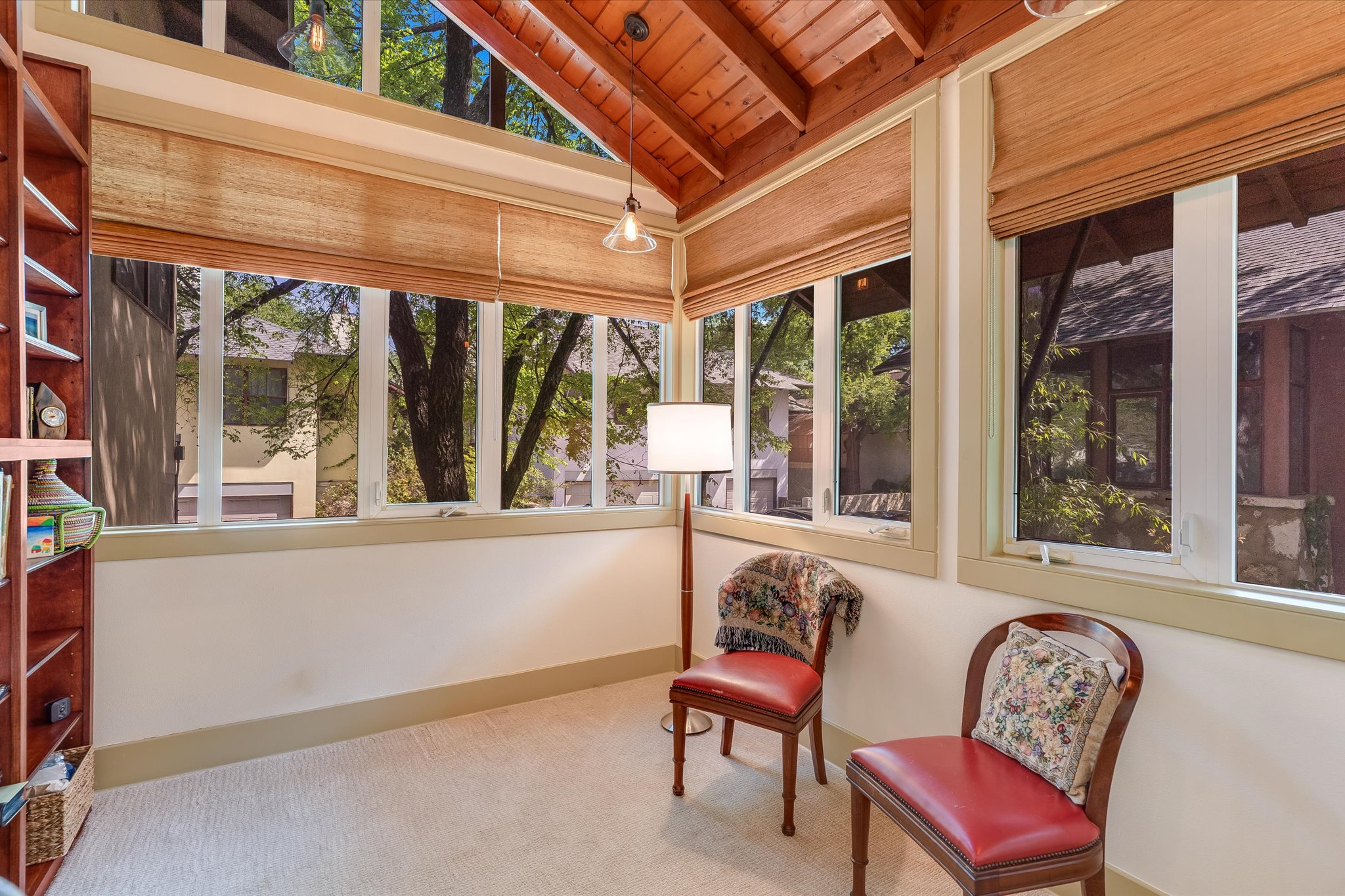 2405 Kinney Road, Unit 2405 Austin, TX 78704 - Photo 6 of 15 Ideal space in the landing for an Office or sitting area.
Carpet flooring, vaulted wood ceiling, and a wealth of natural light