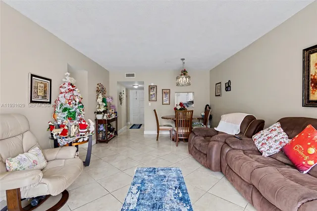 a living room with furniture and a couch
