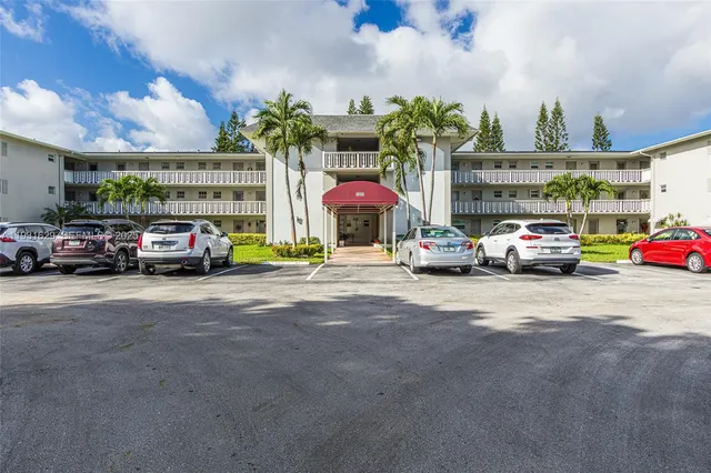 a cars parked in front of a building