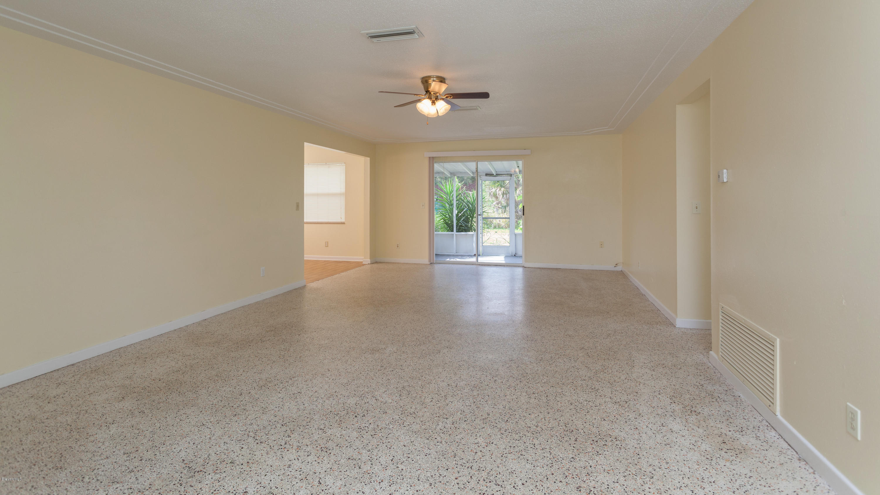 820 Sandgate Street Merritt Island, FL 32953 - Photo 2 of 13 a view of a livingroom with a window