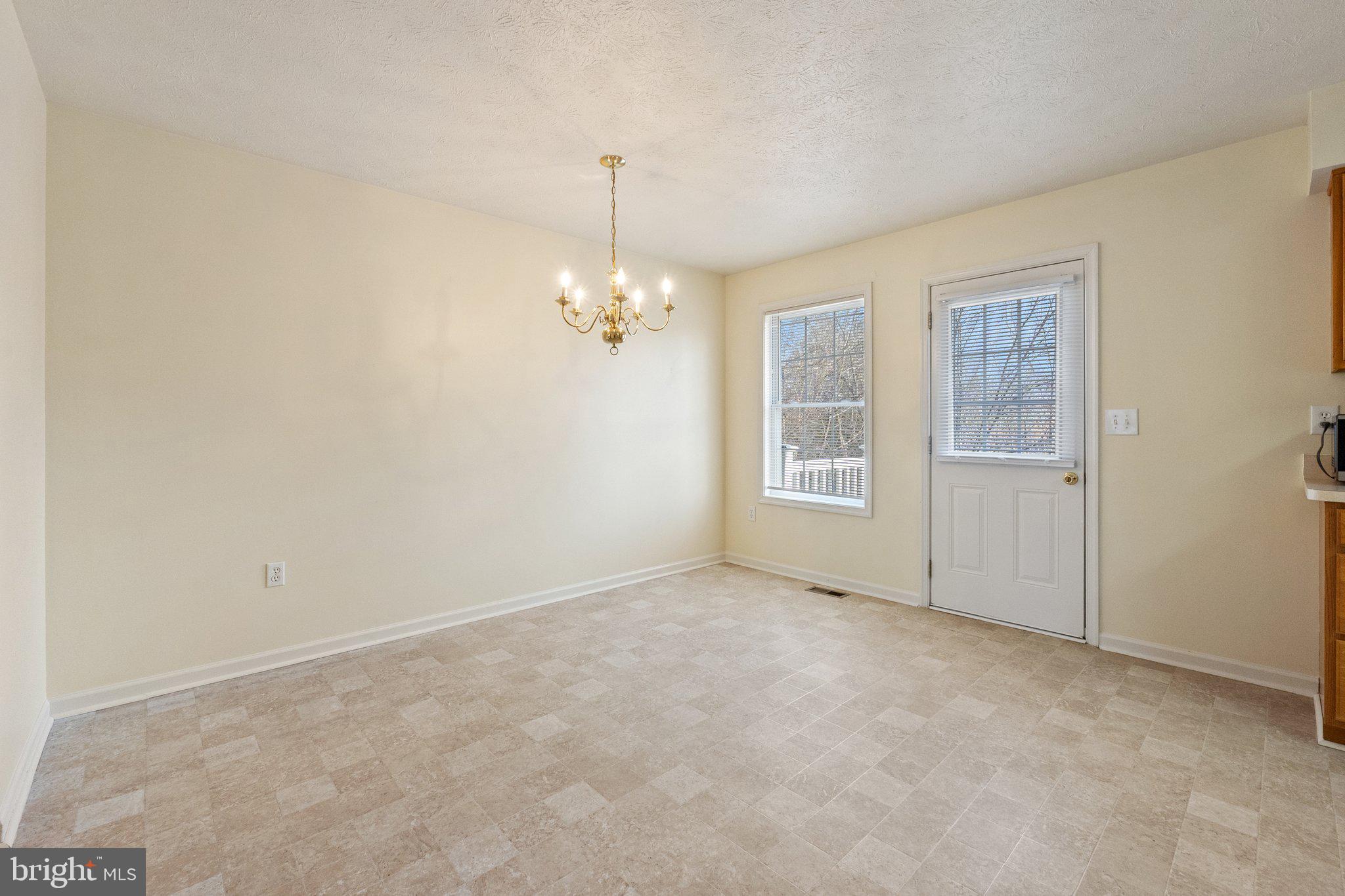 209 Ridgefield Avenue Stephens City, VA 22655 - Photo 9 of 31 Convenient access to rear deck
