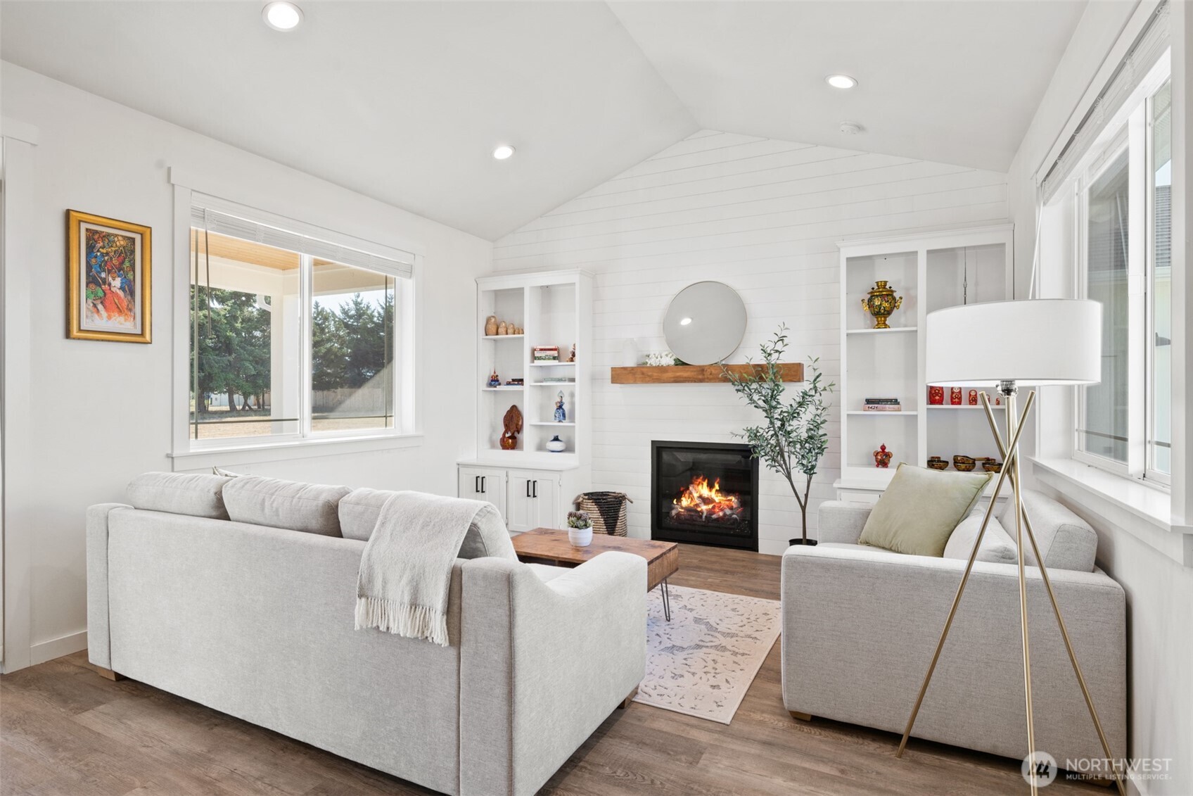 195 Laura Lane Sequim, WA 98382 - Photo 12 of 32 a living room with furniture and a fireplace