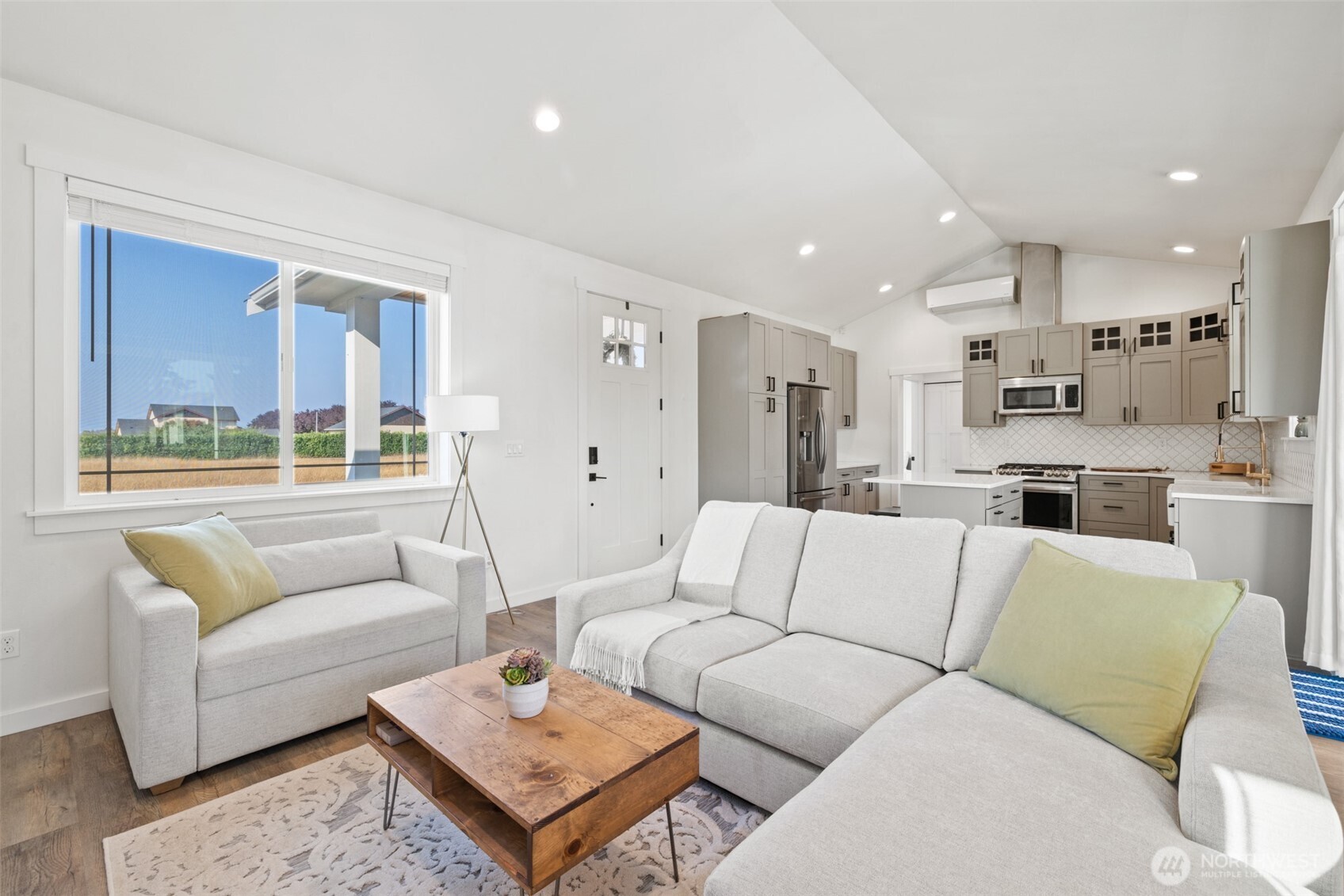 195 Laura Lane Sequim, WA 98382 - Photo 14 of 32 a living room with furniture and a large window