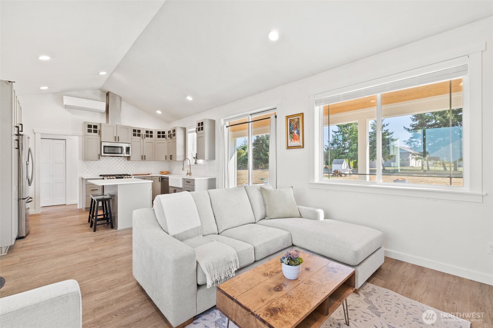 195 Laura Lane Sequim, WA 98382 - Photo 15 of 32 a living room with furniture and a large window