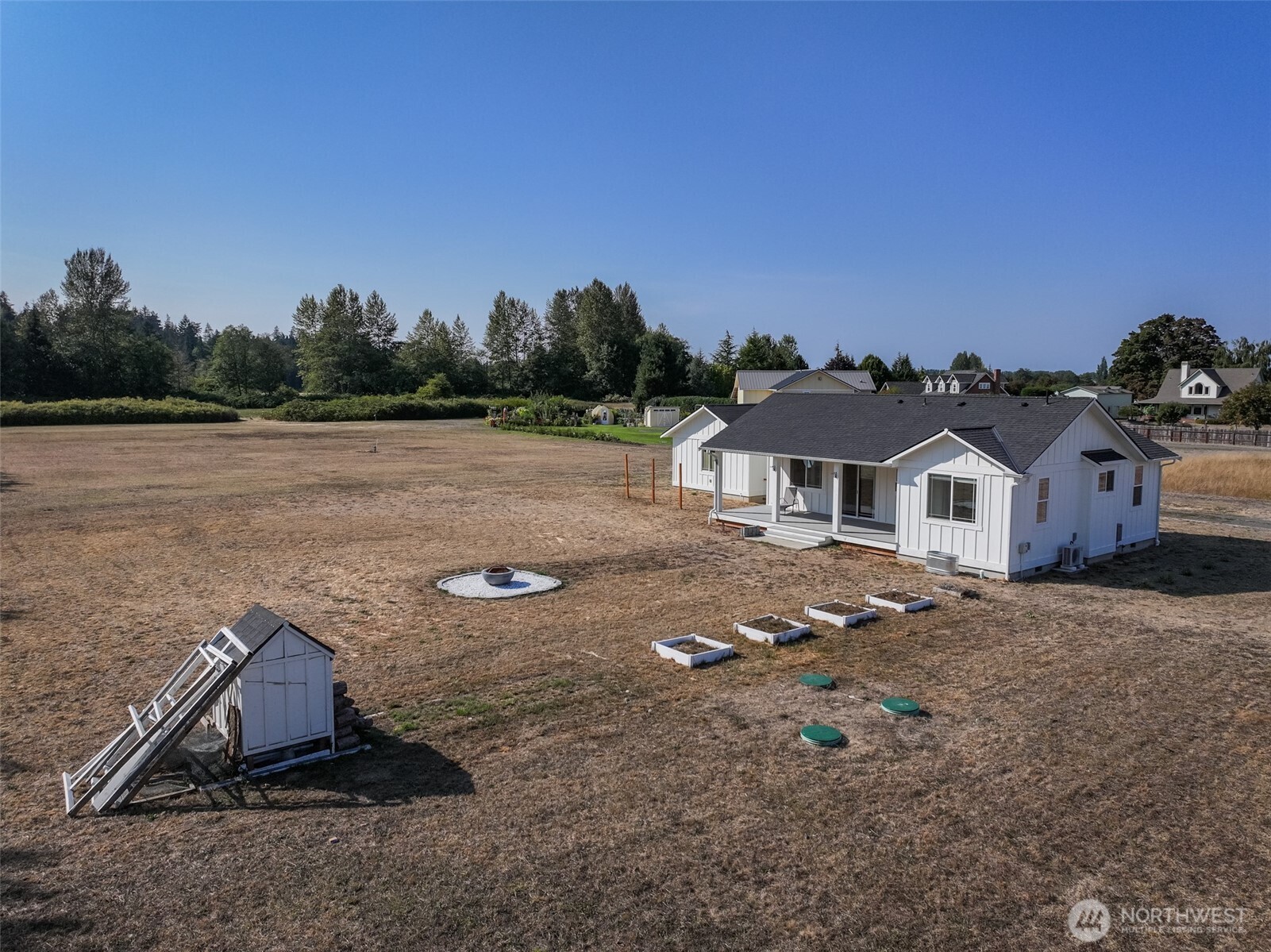 195 Laura Lane Sequim, WA 98382 - Photo 29 of 32 a view of a house with a yard