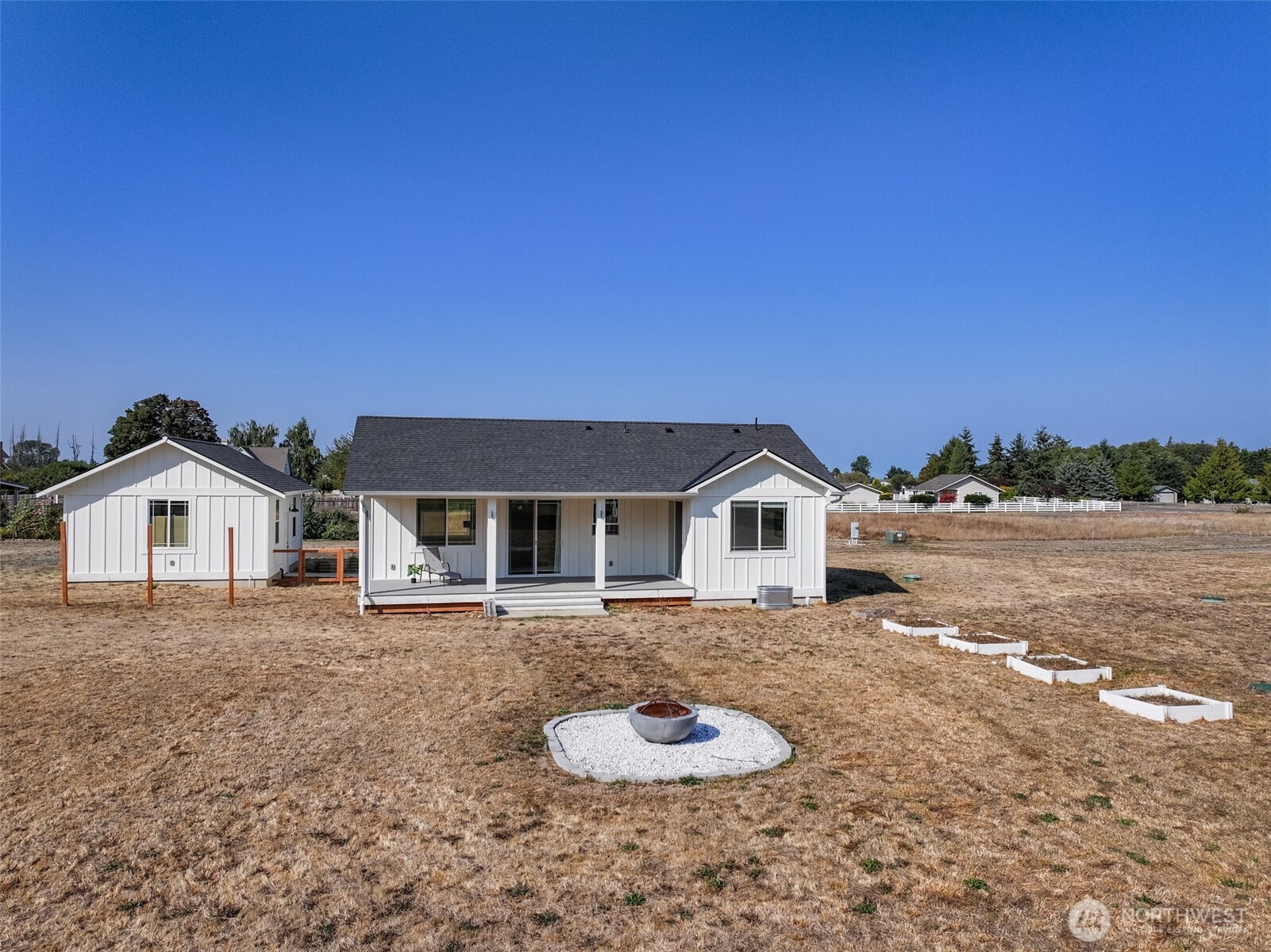 195 Laura Lane Sequim, WA 98382 - Photo 30 of 32 a front view of a house with a yard