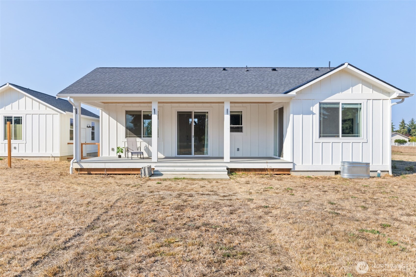 195 Laura Lane Sequim, WA 98382 - Photo 5 of 32 a view of a house with wooden floor and a yard