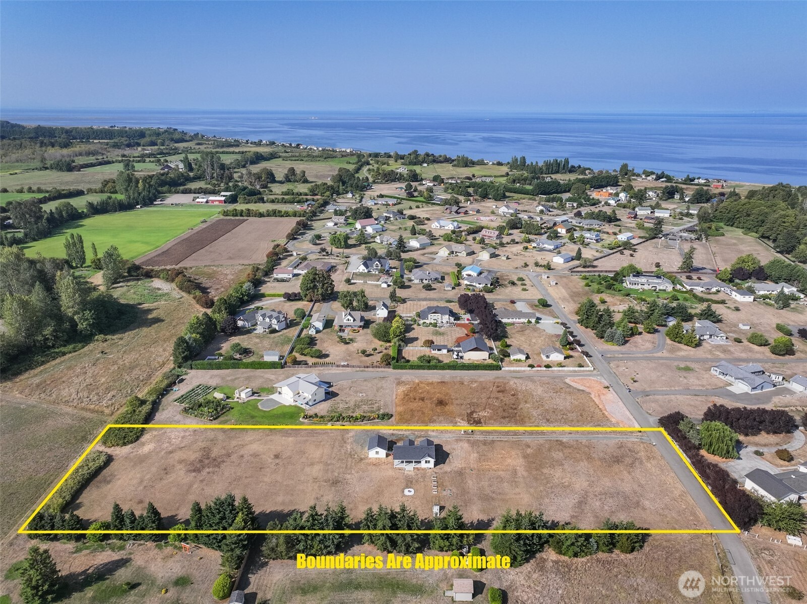 195 Laura Lane Sequim, WA 98382 - Photo 6 of 32 an aerial view of residential houses with outdoor space