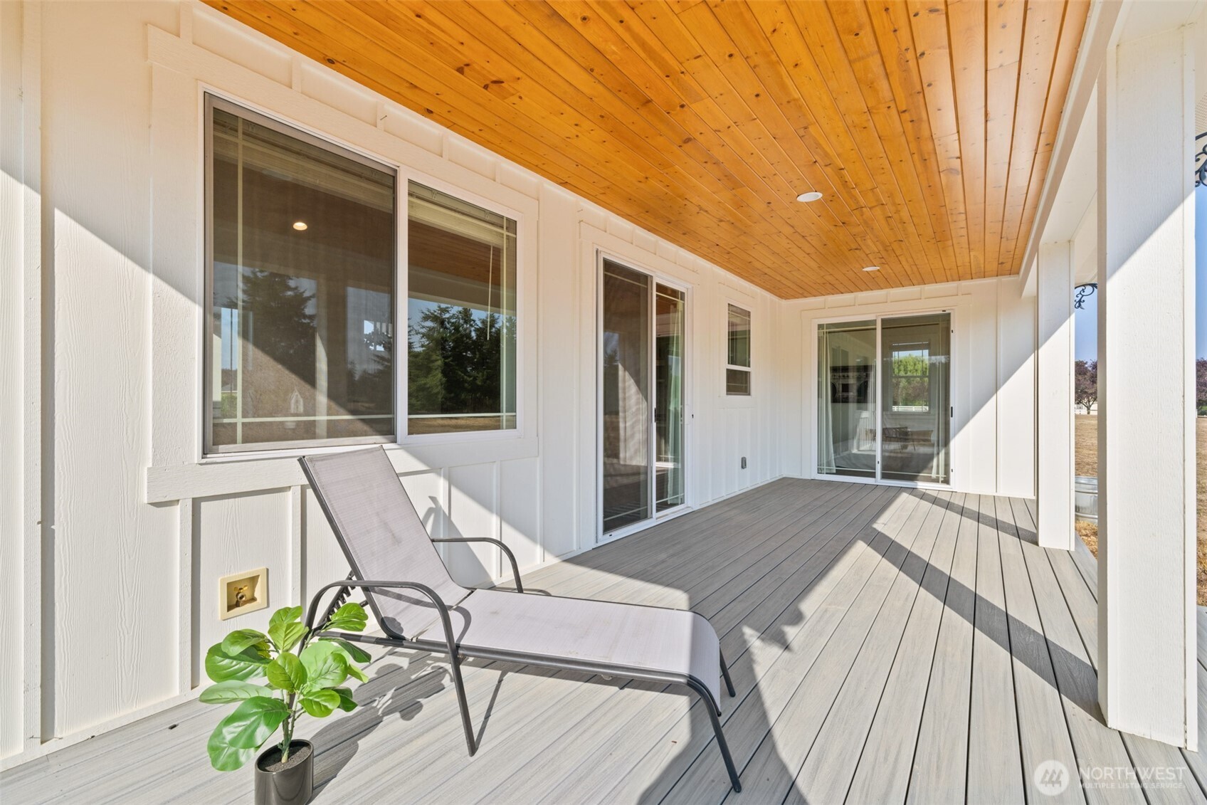 195 Laura Lane Sequim, WA 98382 - Photo 7 of 32 a balcony with table and chairs