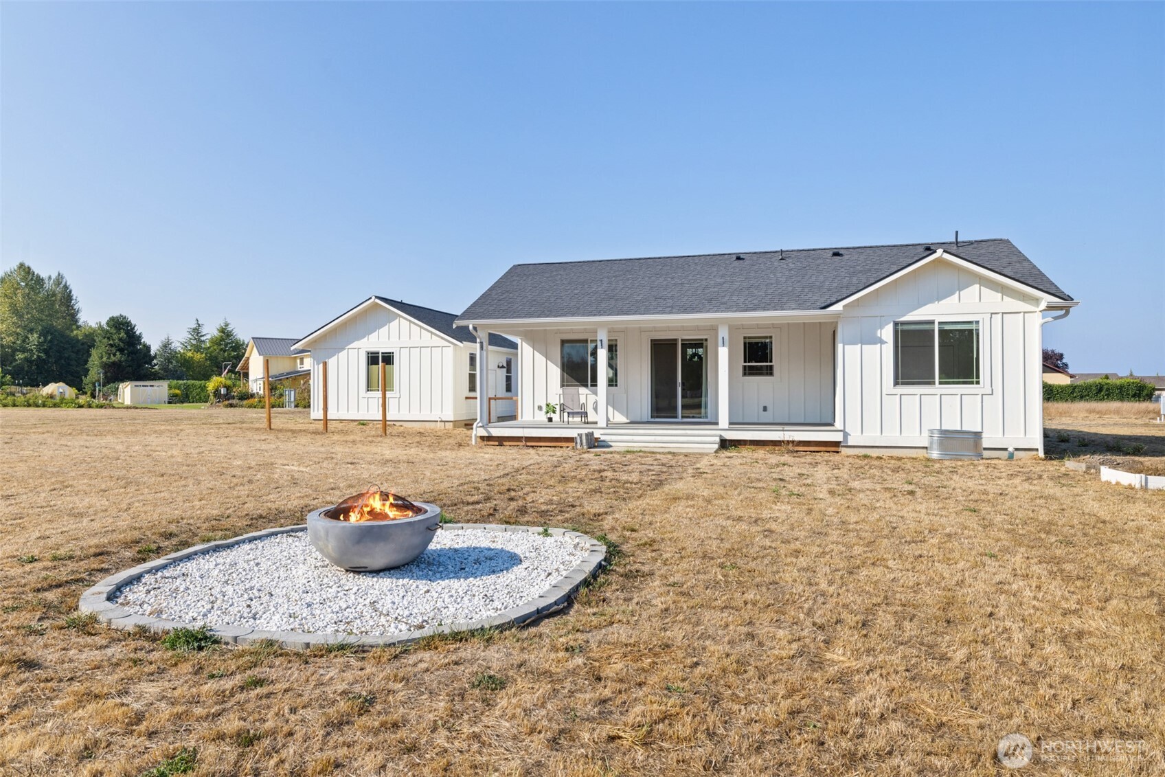 195 Laura Lane Sequim, WA 98382 - Photo 9 of 32 a front view of a house with garden