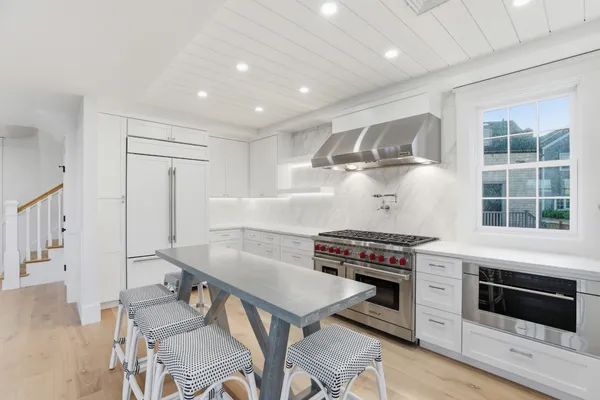 a view of a windows and a fireplace in a room