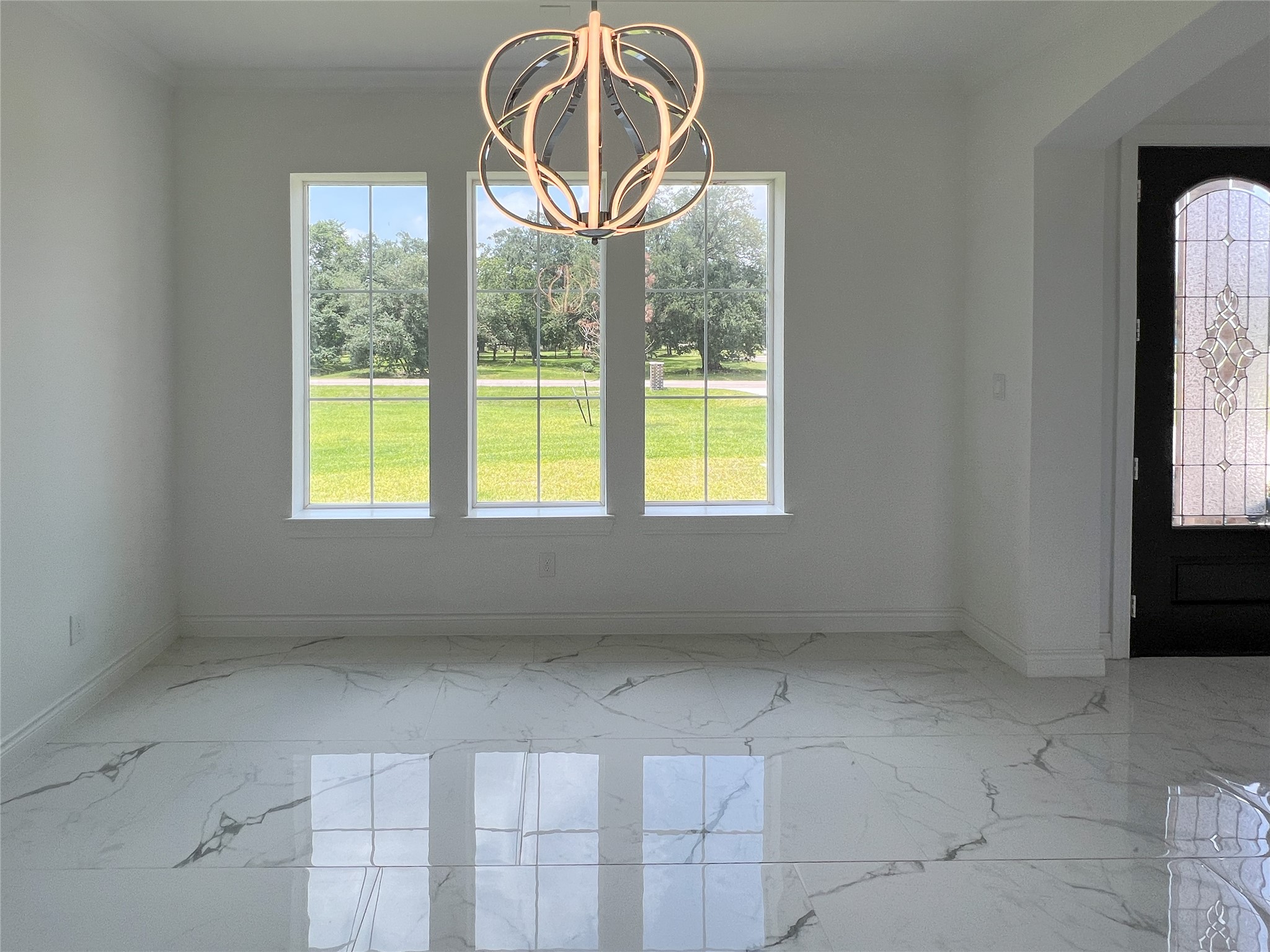 126 Lakeland Circle Rosharon, TX 77583 - Photo 12 of 49 a view of an empty room with a window