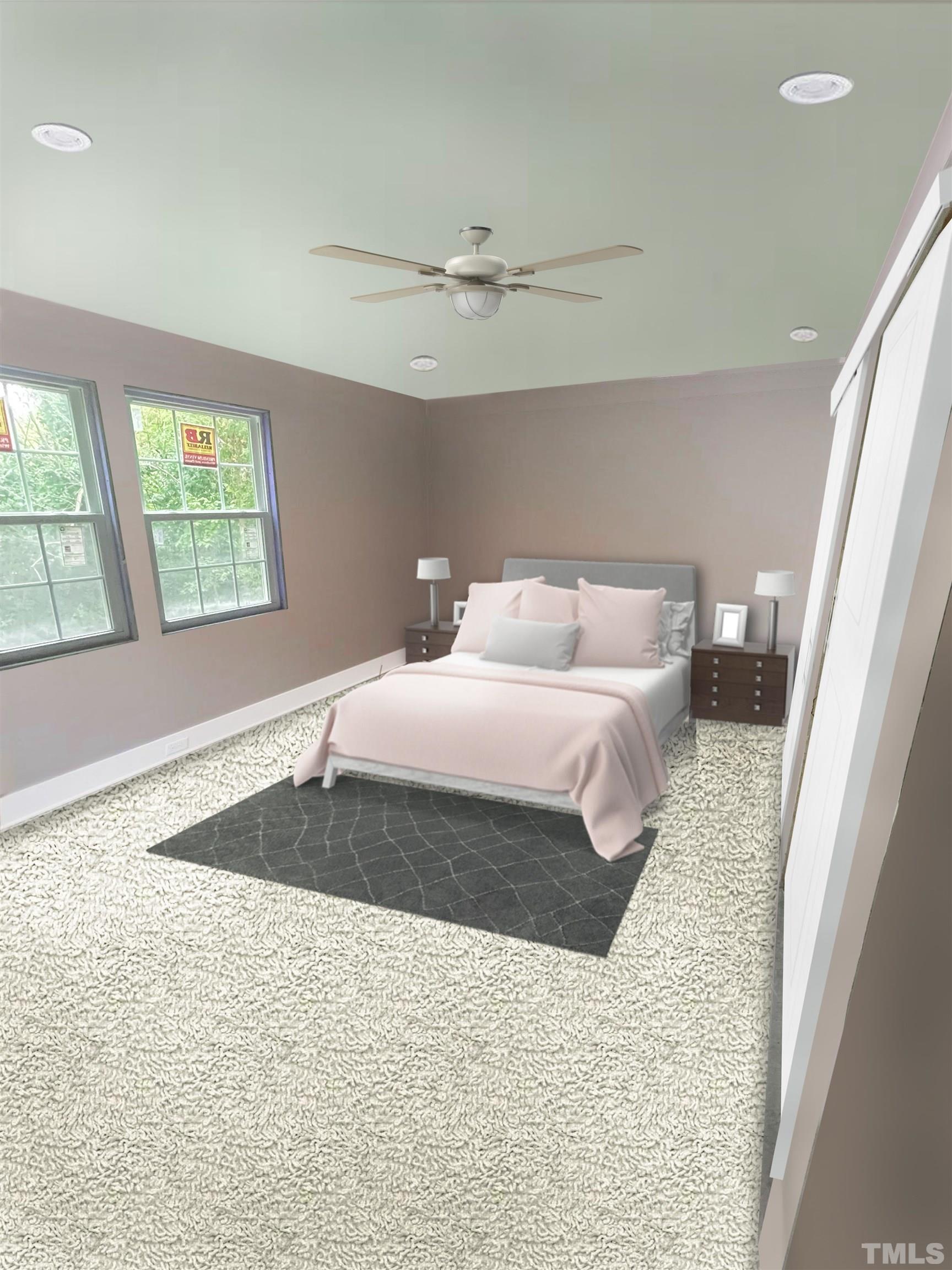 1412 East Jones Street Raleigh, NC 27610 - Photo 12 of 41 a bedroom with a bed and a window