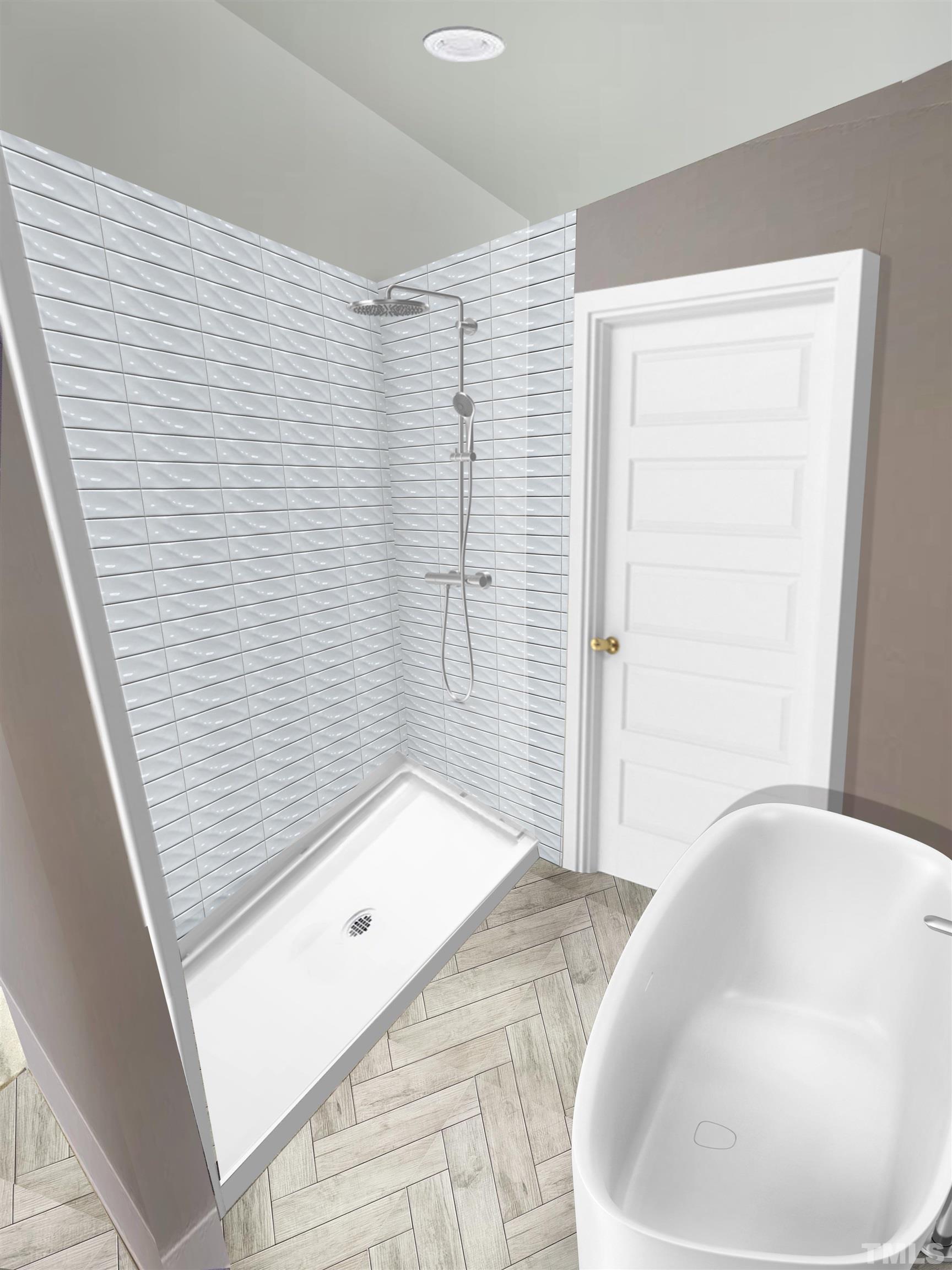 1412 East Jones Street Raleigh, NC 27610 - Photo 13 of 41 a bathroom with a bathtub and shower