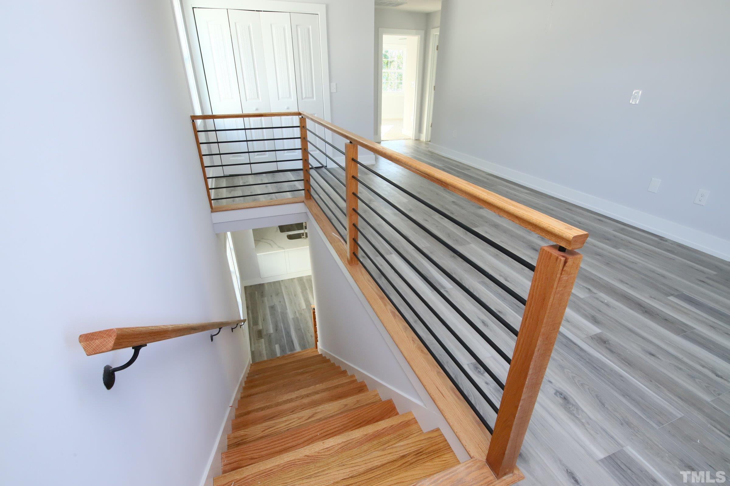 1412 East Jones Street Raleigh, NC 27610 - Photo 17 of 41 a view of a staircase